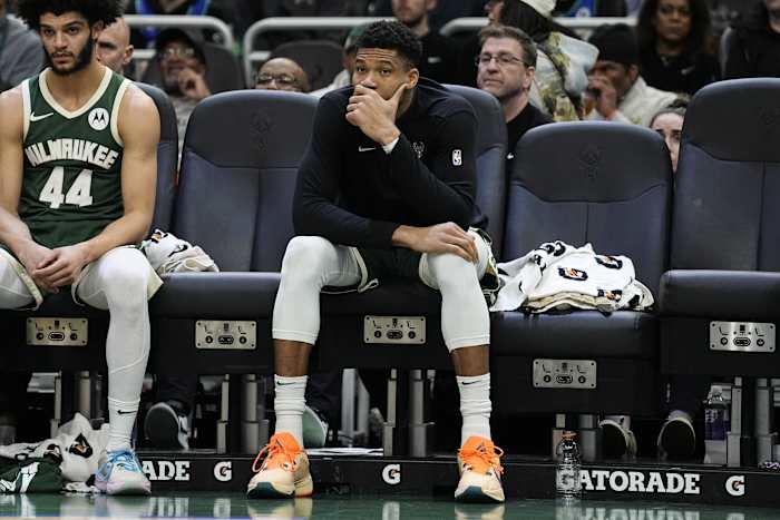 Milwaukee Bucks forward Giannis Antetokounmpo (34) looks on from the bench during the fourth quarter against the Minnesota Timberwolves 